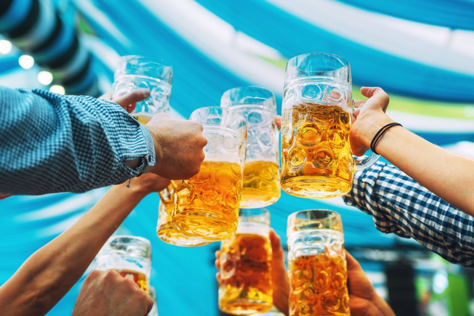 München: Oktoberfest Experience and Lunch in Tent - Reserved Table in a Traditional Tent: Beer, Bretzel, and Bavarian Snacks