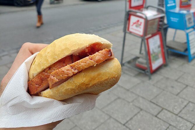 Munich Food Tour with Full Meal & Drinks by Do Eat Better - Marienplatz tavern time: architecture outside, main dish inside