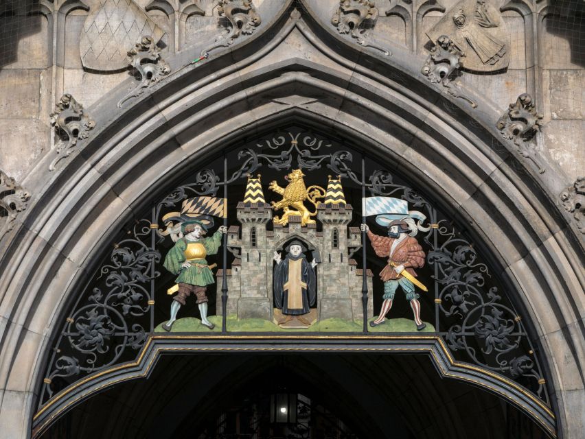 Munich: Guided Tour of the historic Town Hall on Marienplatz - Neo-Gothic façade stories: statues, symbols, and city identity